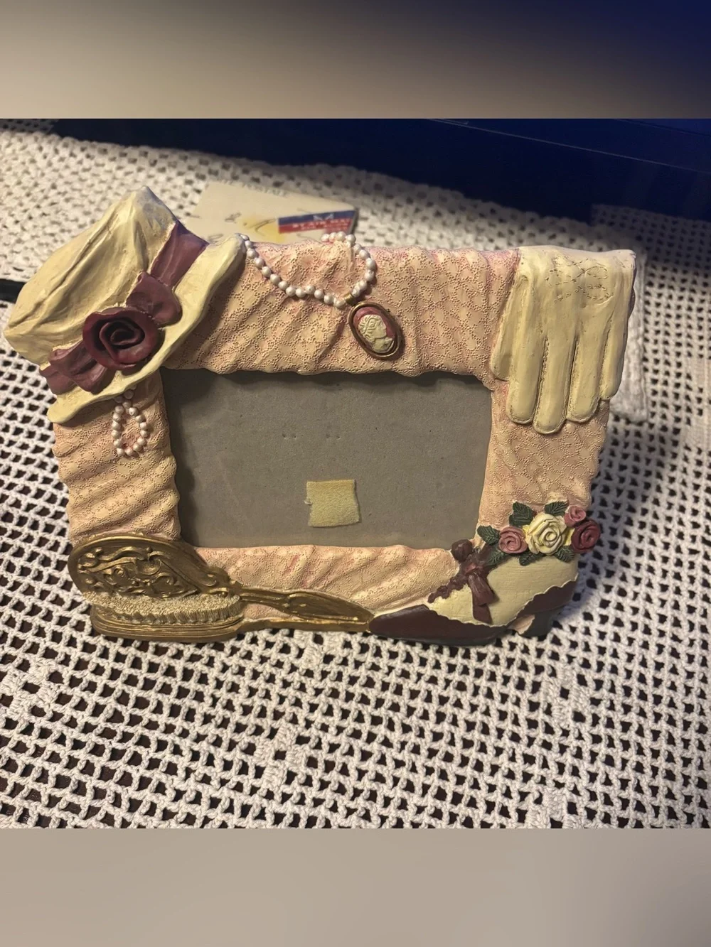 Vintage Victorian-style 3D picture frame manufactured by Figi Ceramics.
